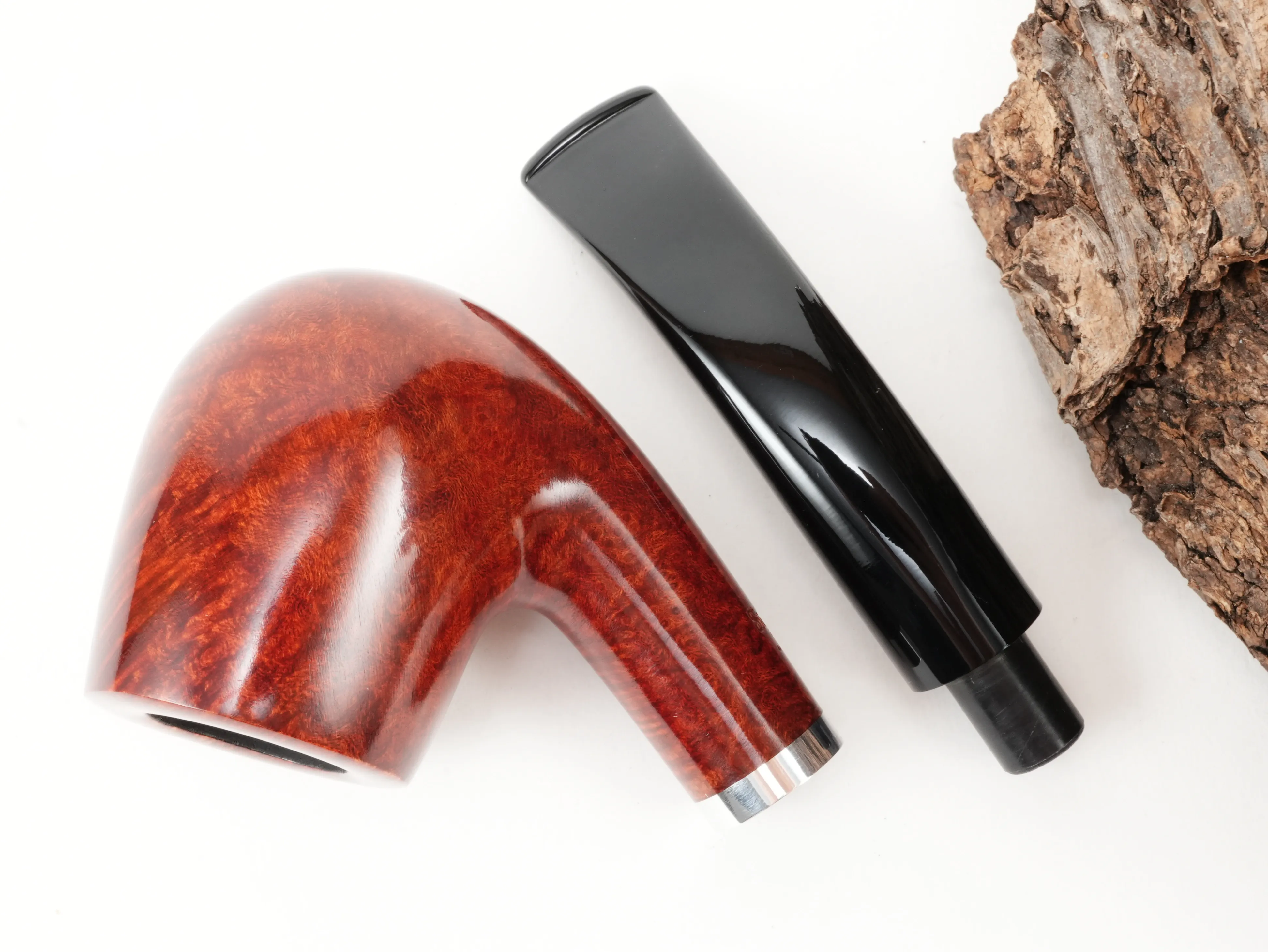Draufsicht auf die zerlegte Stanwell København Terracotta 246 Pfeife mit getrenntem glattem Classic-Pfeifenkopf und schwarzem Mundstück