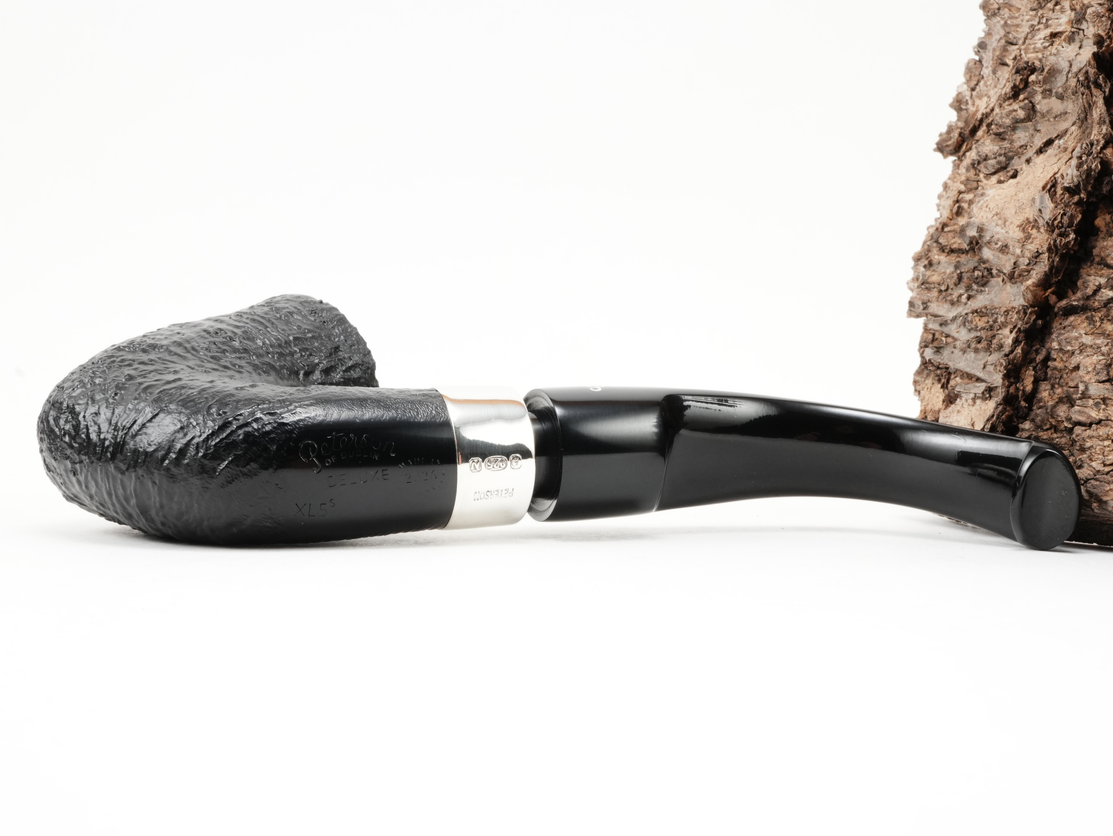 Unterseite der Peterson Deluxe System XL5s mit flachem glatten Holzfeld und eingeprägtem Peterson-Stempel sowie Modellnummer XL5s