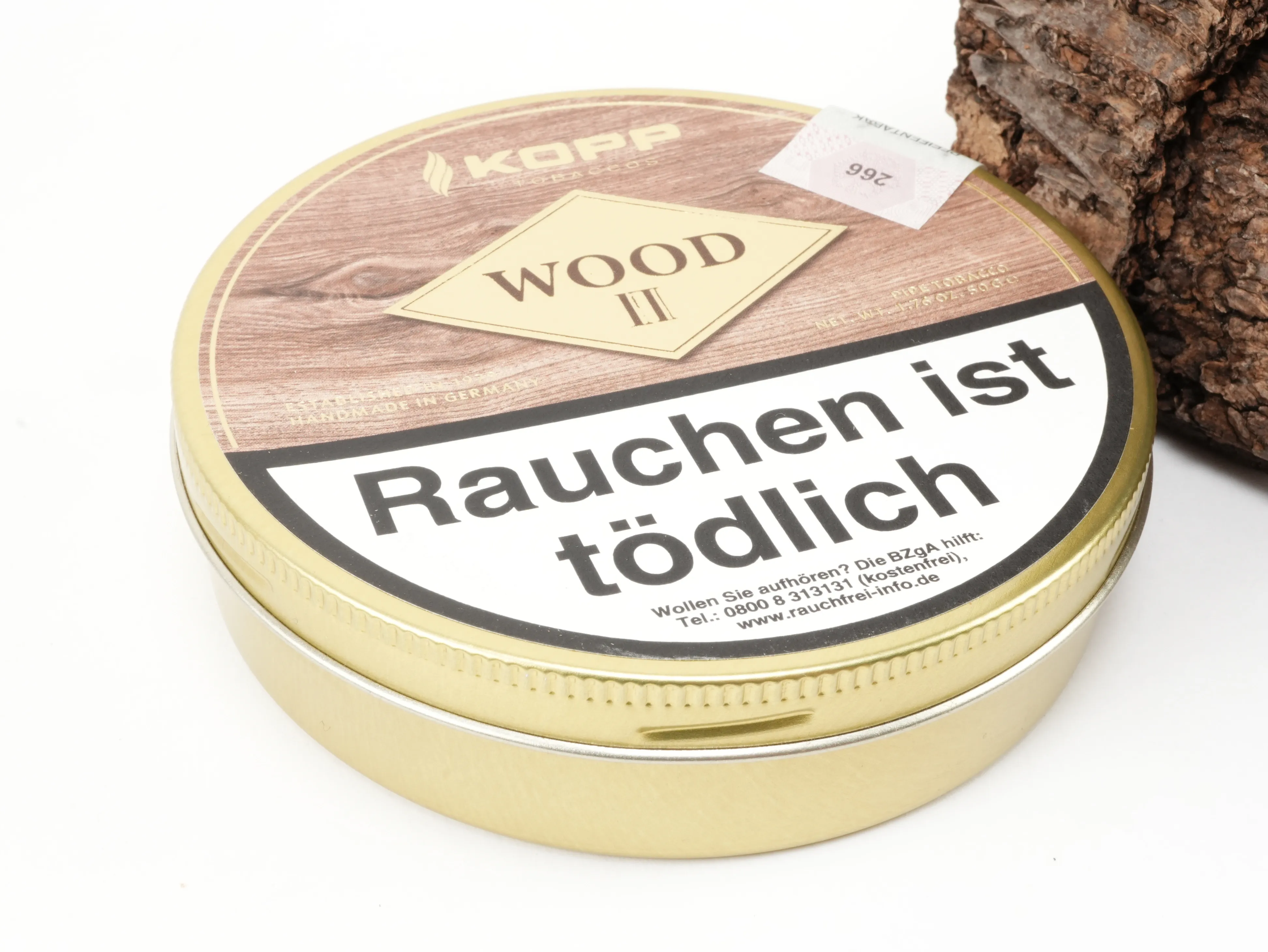 Schräge Perspektivansicht der geschlossenen Kopp Wood II Tabakdose mit Banderole