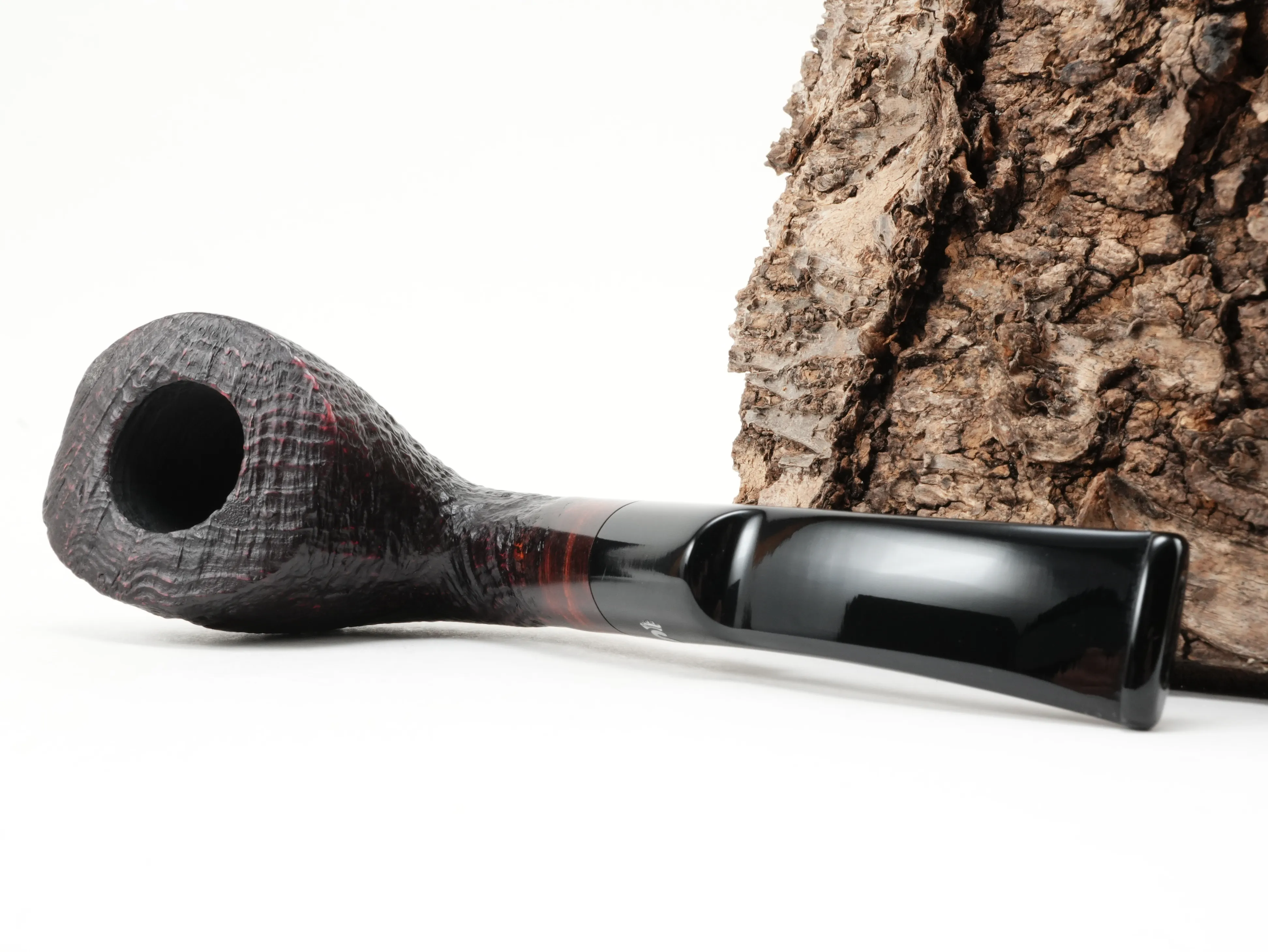 Stanwell Vario 409 Half-Bent Freestyle Pfeife liegend von schräg hinten mit glattem rot-braun poliertem Holmabschnitt