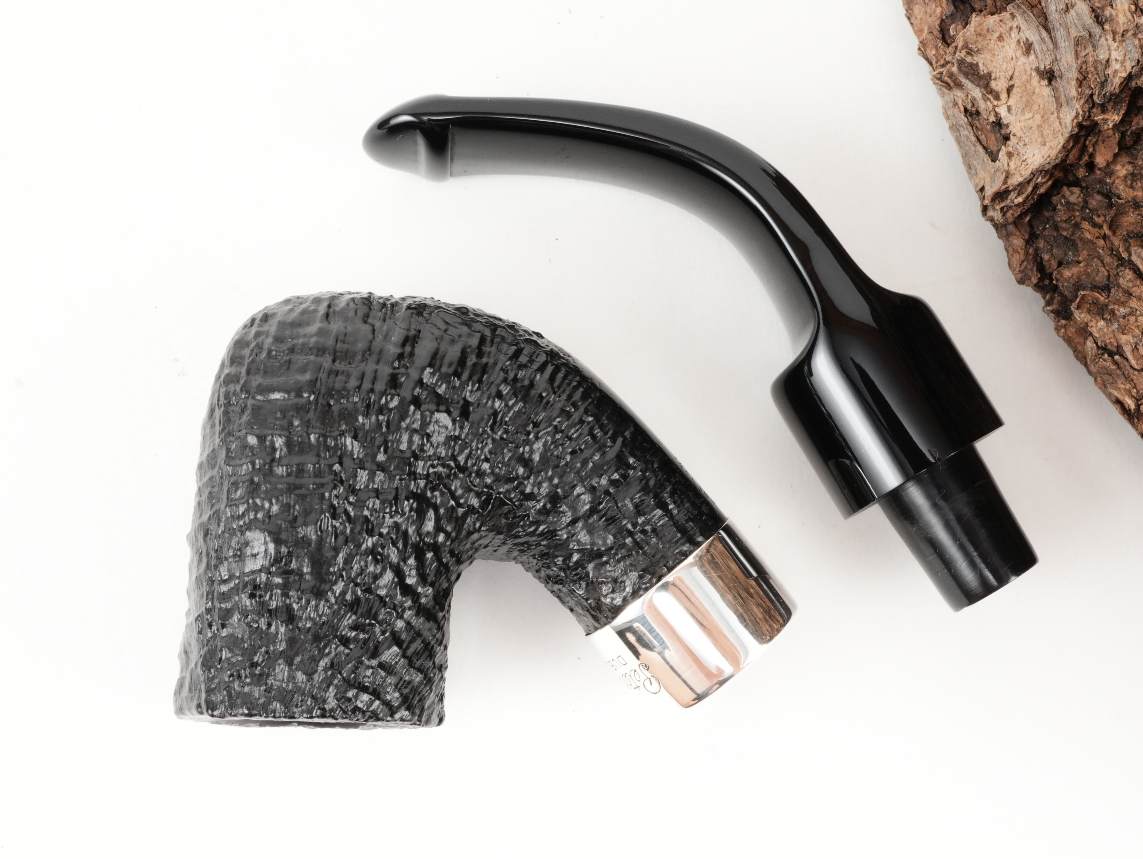Zerlegte Peterson Deluxe System 8s mit Blick auf die Holmbohrung mit Sterling-Silberring und den Steckzapfen