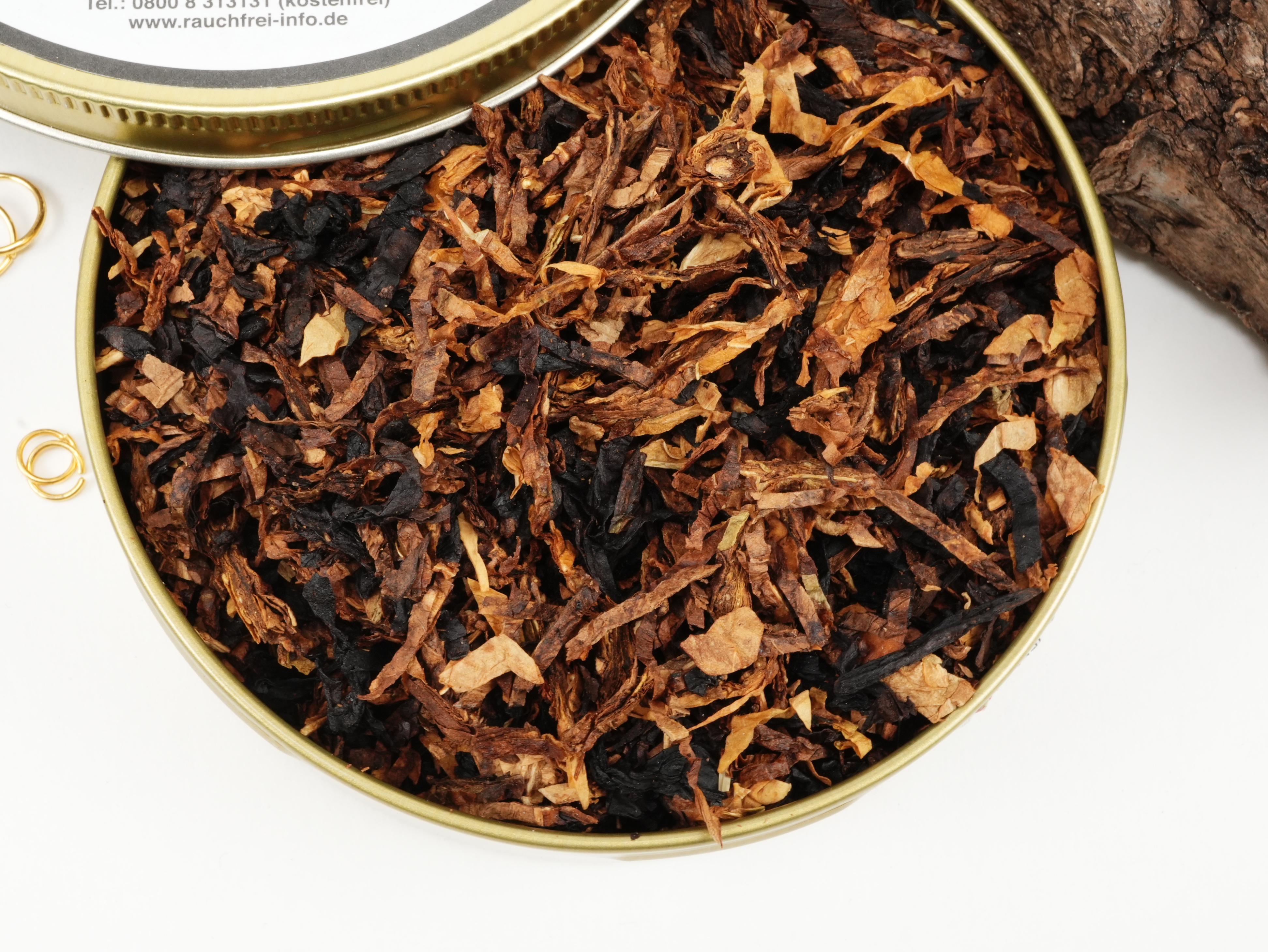 geöffnete runde 50g Dose des UNITY Pfeifentabaks von oben mit direktem Blick auf den aromatisierten Blend
