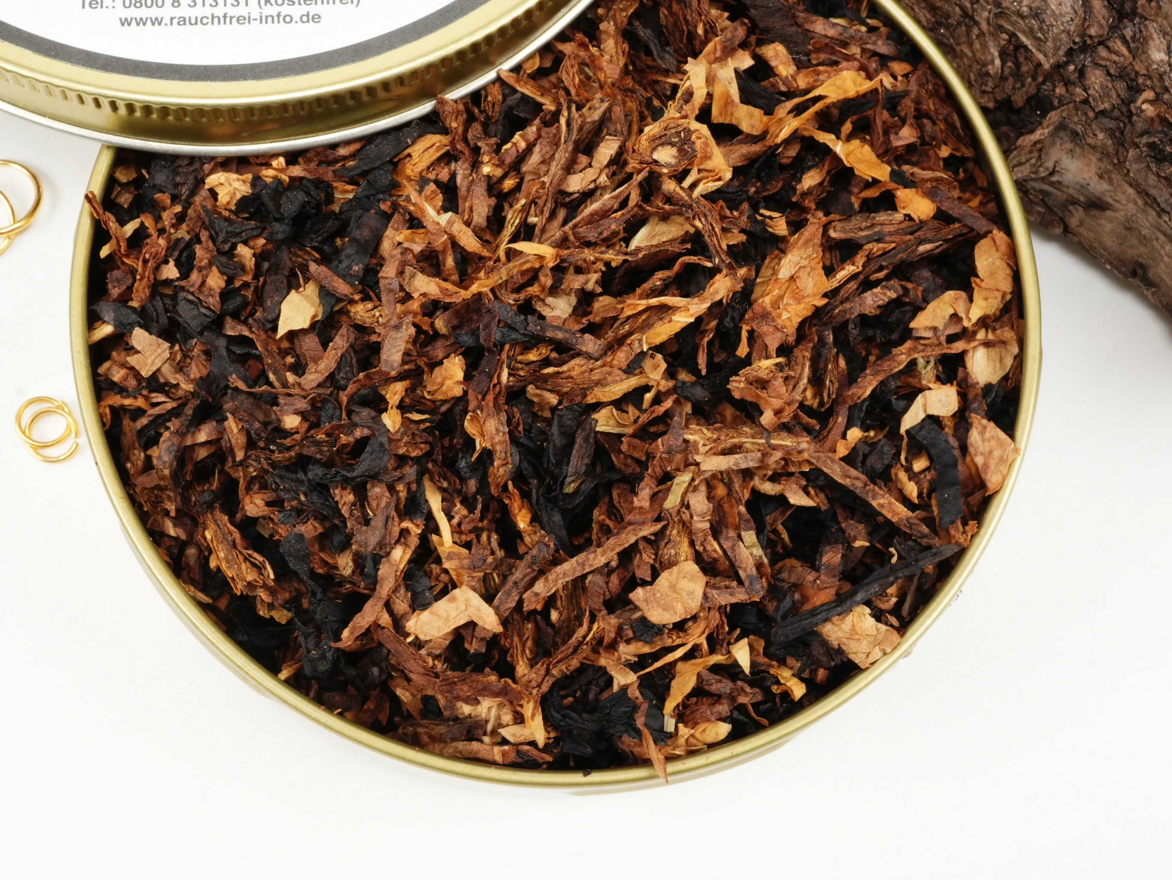 geöffnete runde 50g Dose des UNITY Pfeifentabaks von oben mit direktem Blick auf den aromatisierten Blend