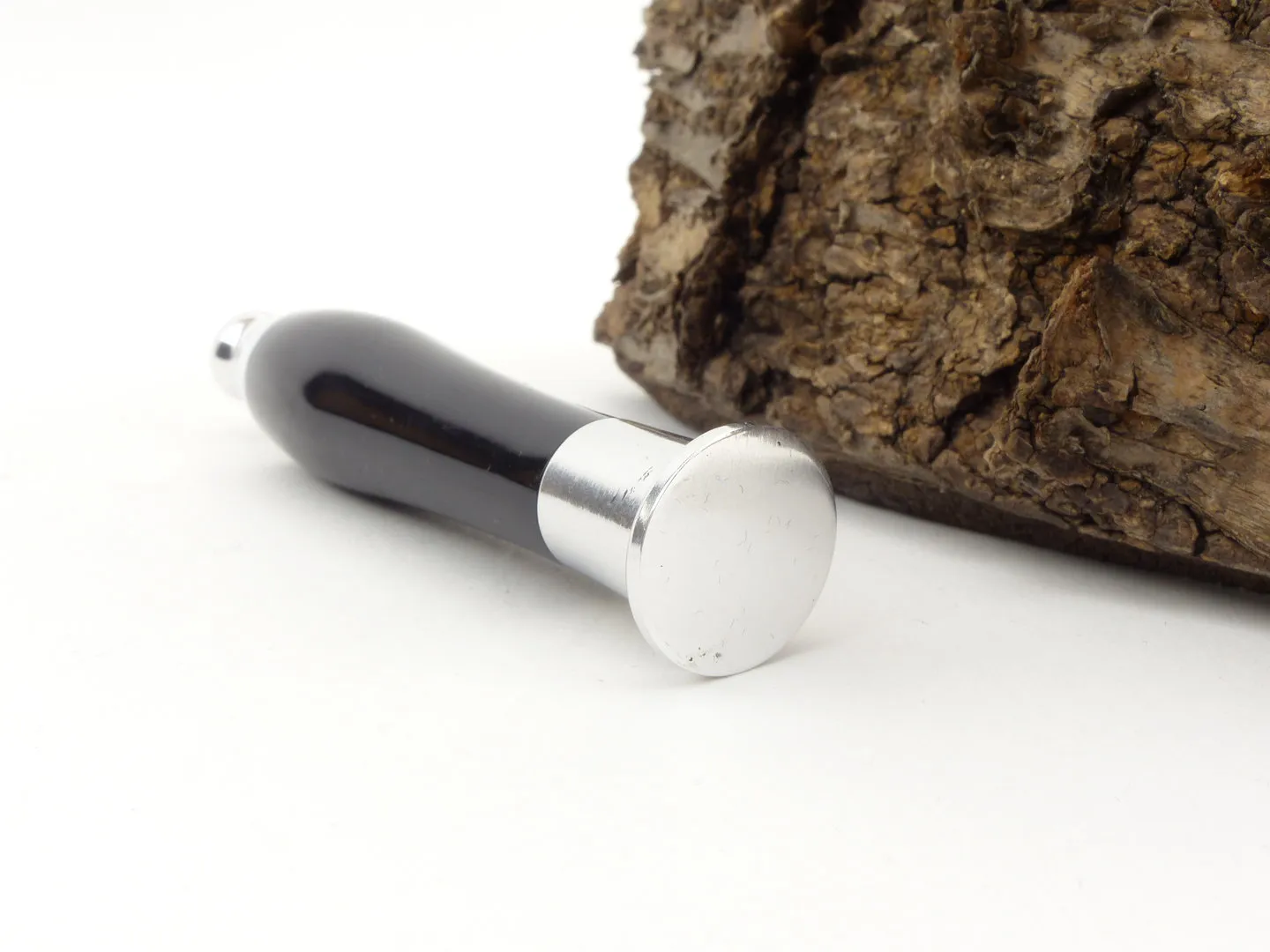 talamona_stopfer_100_black_round_2