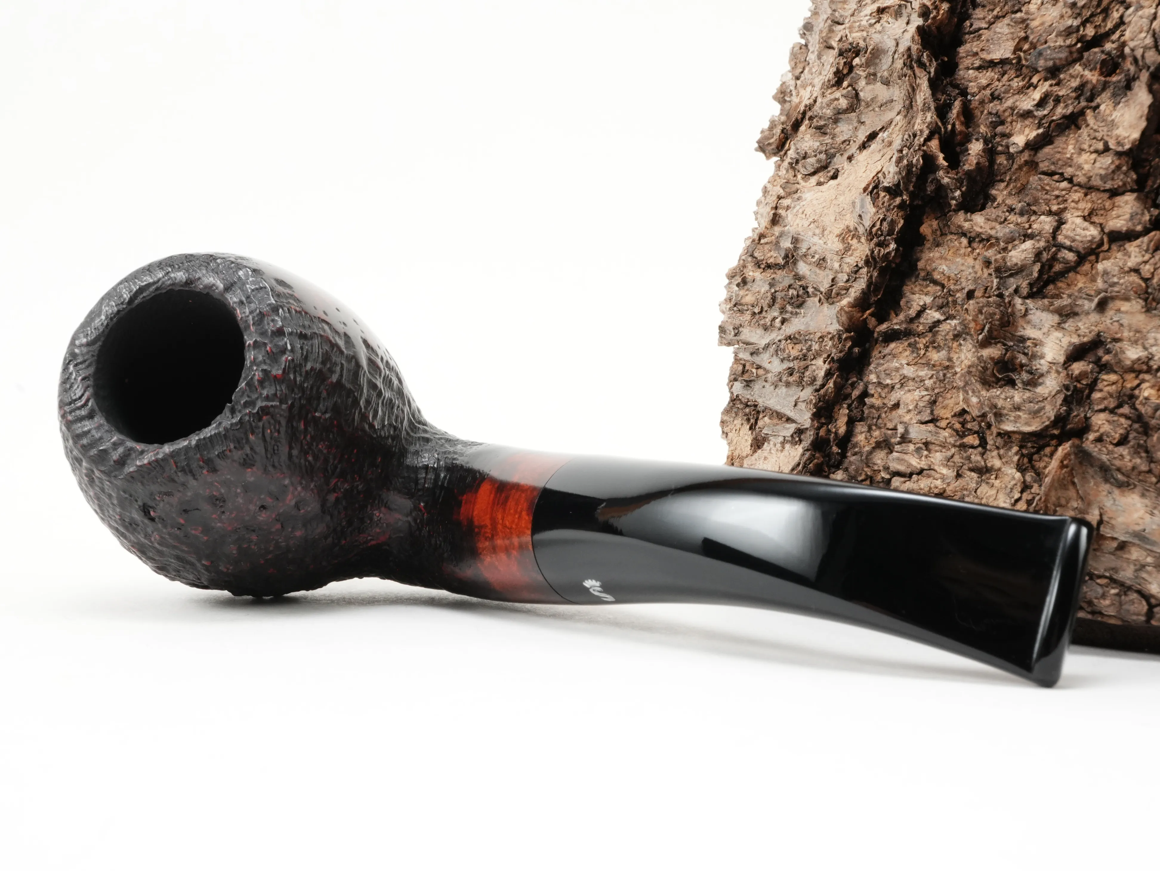 Stanwell Vario 185 Bent Apple Pfeife liegend von schräg hinten mit glattem rot-braun poliertem Holmabschnitt