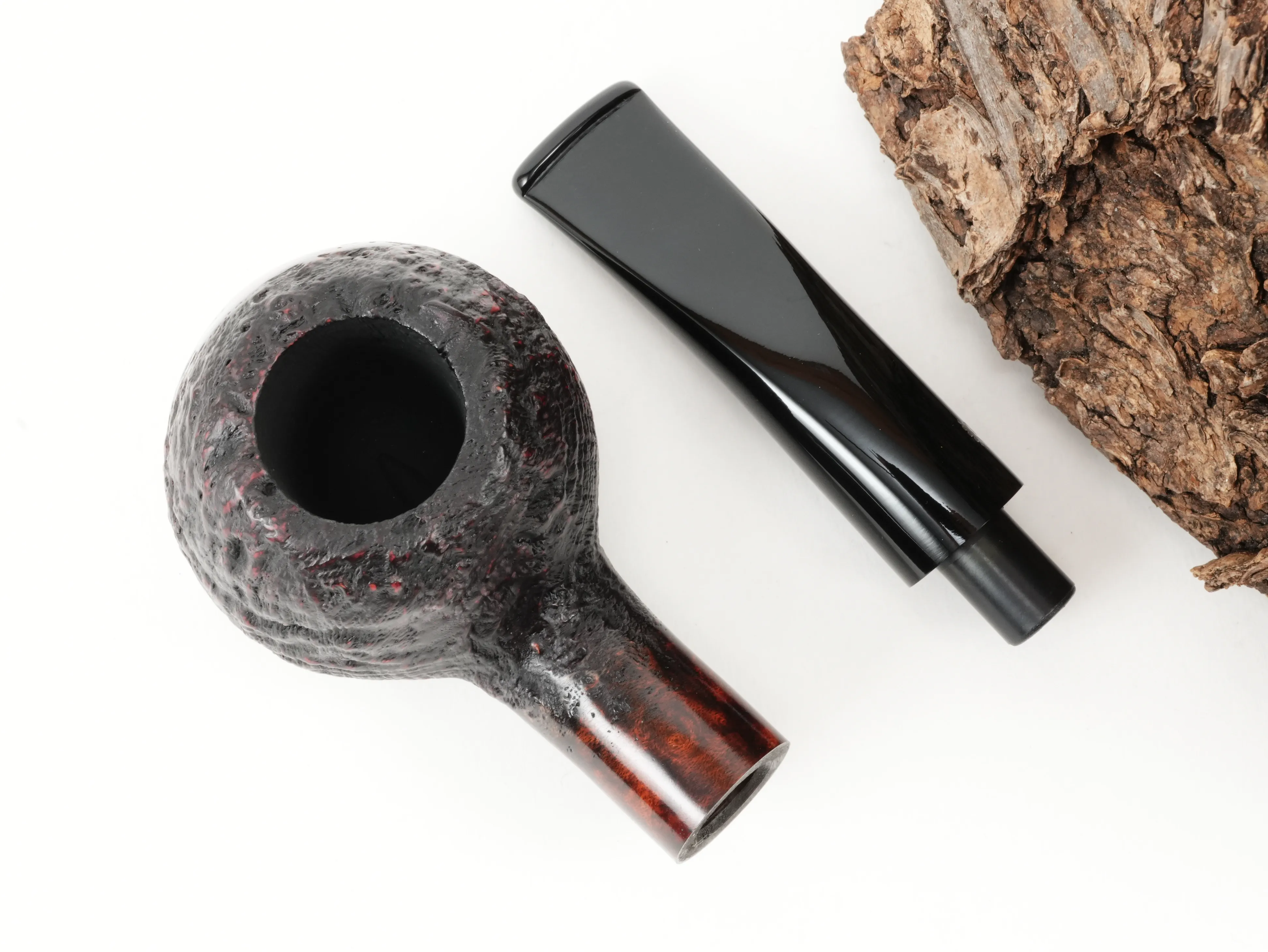 Draufsicht auf die zerlegte Stanwell Vario 109 Pfeife mit getrenntem Brandy-Pfeifenkopf und schwarzem Mundstück