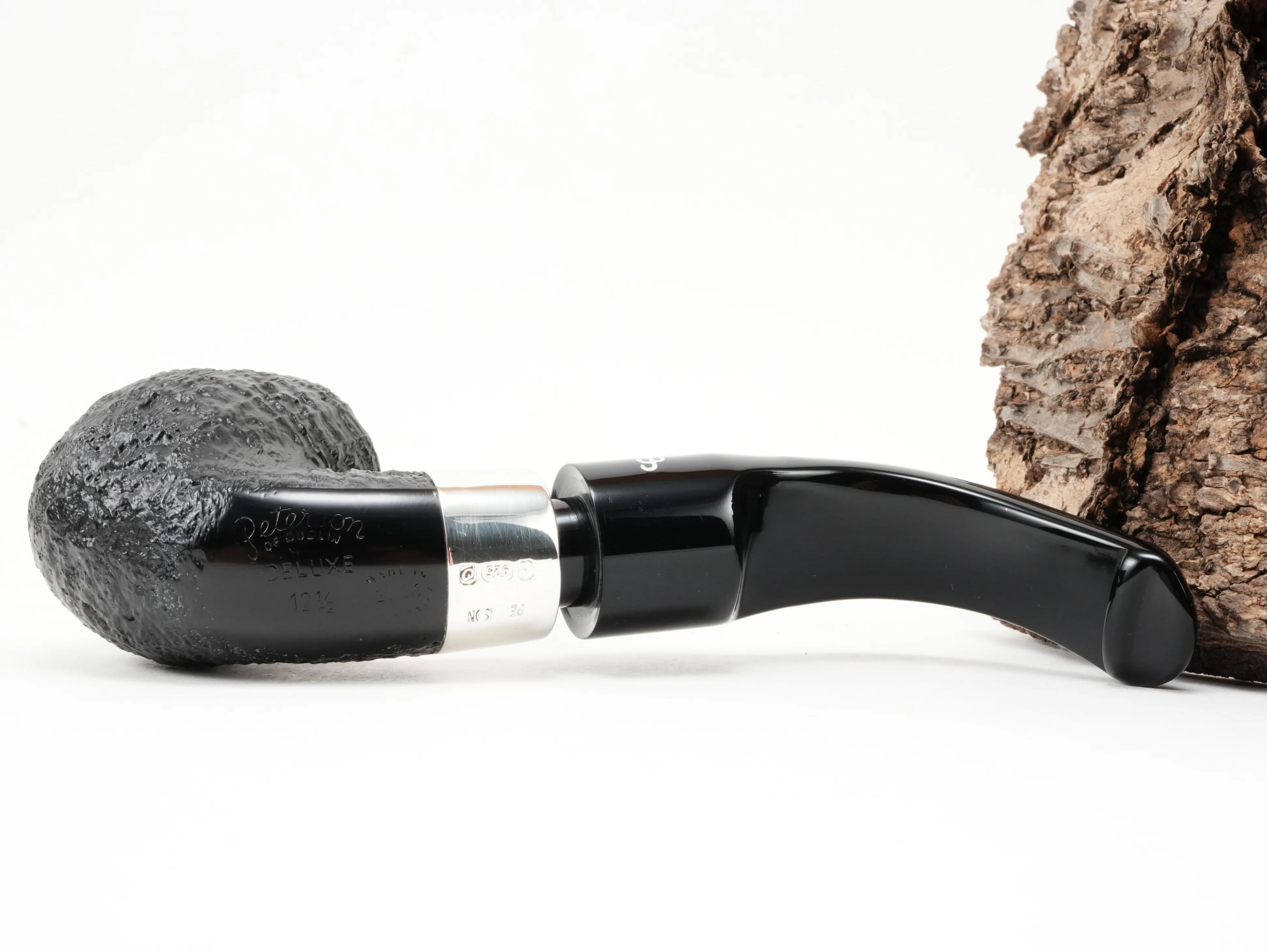 Unterseite der Peterson Deluxe System 12,5 mit flachem glatten Holzfeld und eingeprägtem Peterson-Stempel sowie Modellnummer 12,5