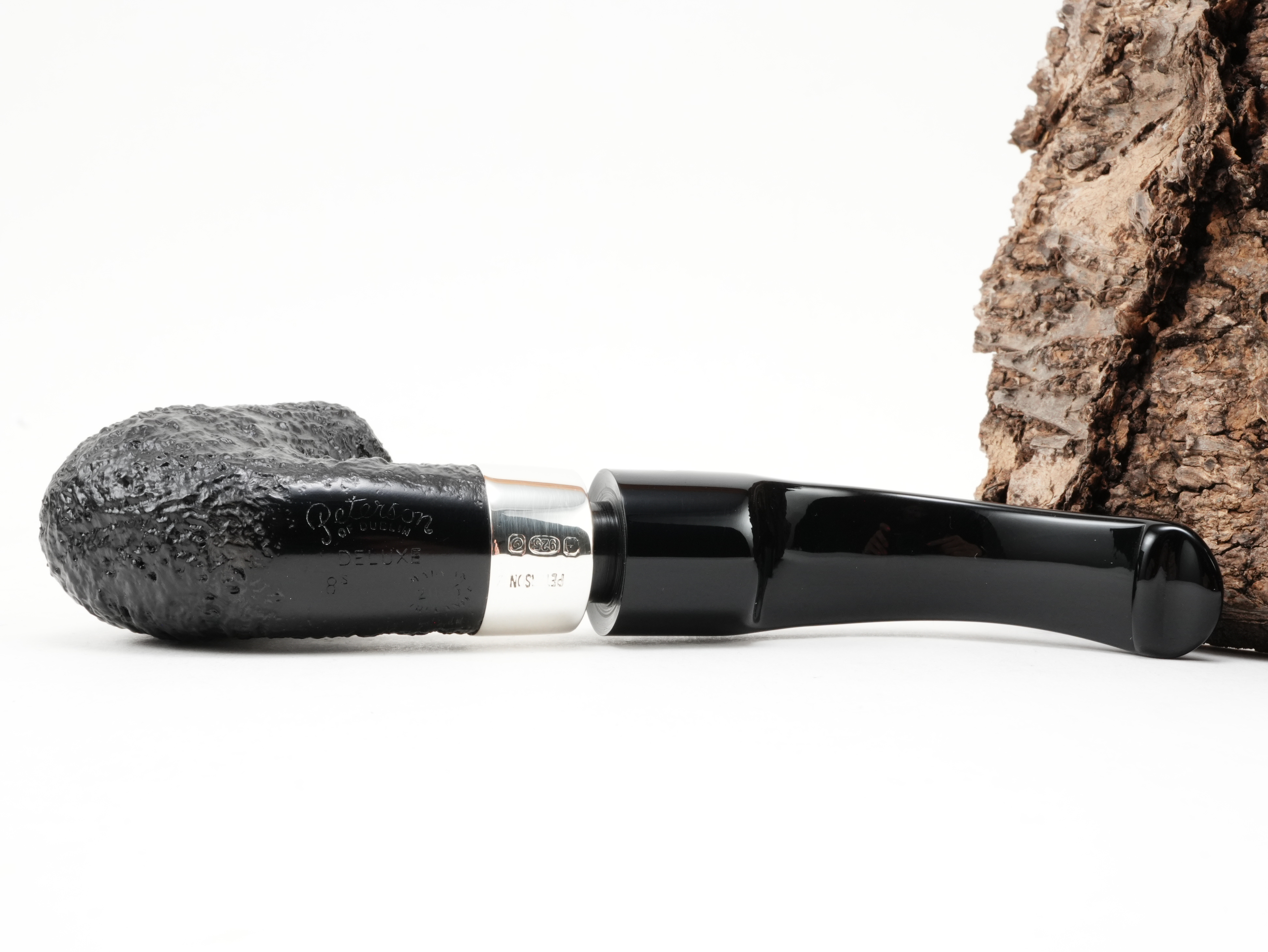 Unterseite der Peterson Deluxe System 8s mit flachem glatten Holzfeld und eingeprägtem Peterson-Stempel sowie Modellnummer 8s